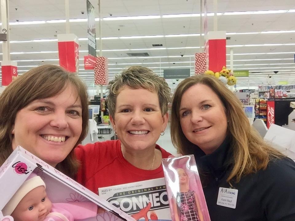 three women in grocery store